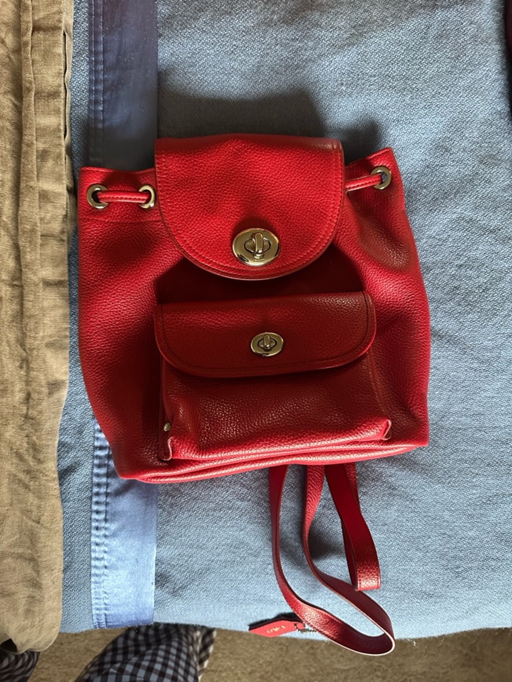 Red Coach pebbled leather mini turnlock rucksack